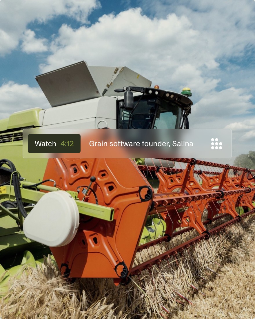 A founder film over a combine harvesting wheat