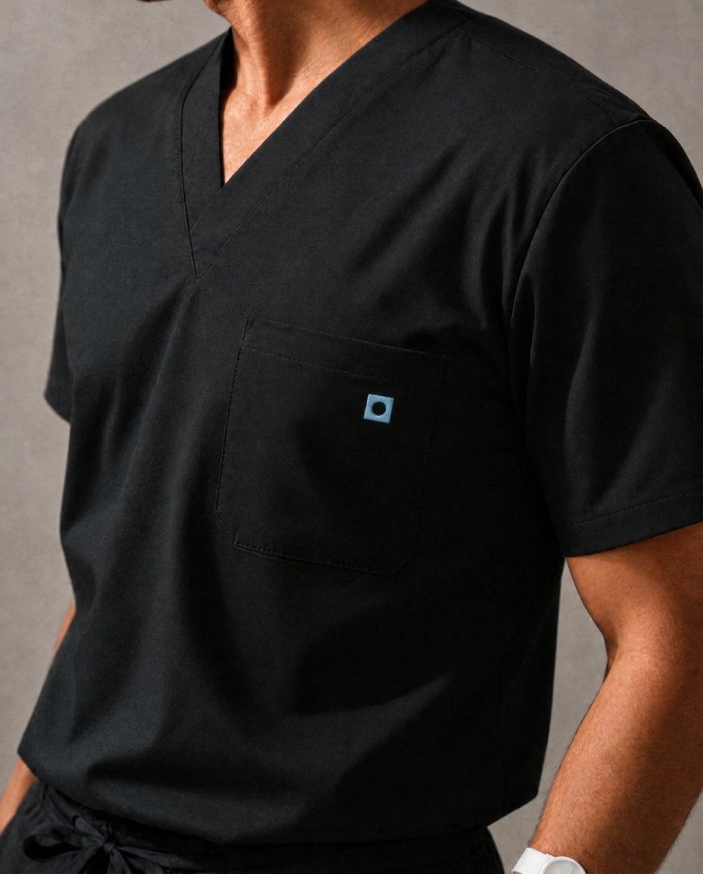 The mark on a scrub pocket